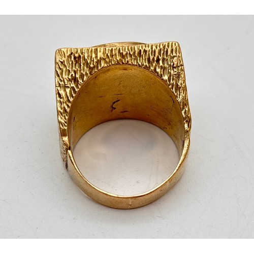 1014 - A men's heavy 9ct gold square shaped signet ring set with a 1903 Edward VII full sovereign. Brushed ... 