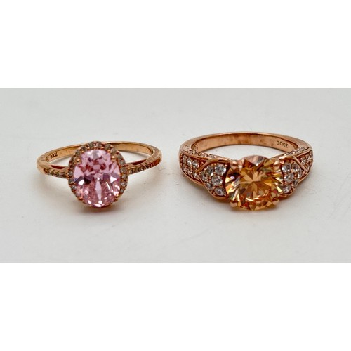 1045 - 2 modern design Diamonique Cubic Zirconia set silver cocktail rings in a yellow gold finish. A halo ... 
