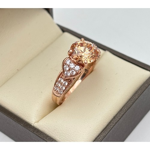 1045 - 2 modern design Diamonique Cubic Zirconia set silver cocktail rings in a yellow gold finish. A halo ... 
