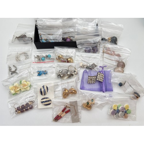 1046 - 60+ pairs of vintage fashion earrings in both drop and stud styles. To include novelty, faux pearl, ... 