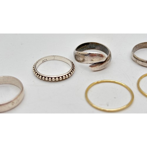 1047 - 8 silver band rings in various widths and designs. To include a crossover style band, a beaded edge ... 