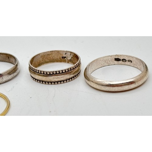 1047 - 8 silver band rings in various widths and designs. To include a crossover style band, a beaded edge ... 