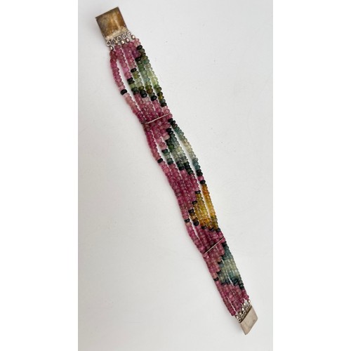 1059 - A 5 strand faceted multi coloured tourmaline bead bracelet with large square push clasp & safety cli... 