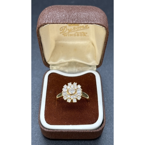 An 18ct yellow gold, diamond cluster ring comprising 15 brilliant cut diamonds and 6 baguette cut diamonds all in a claw setting. Total diamond weight 1ct. Full hallmarks to inside of plain shank. Size O. Total weight approx. 4g. Complete with International Jewellery Creations certificate of Insurance.