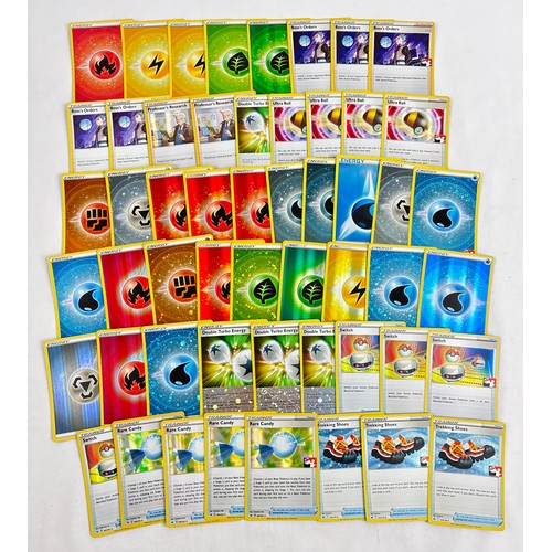59 - Approx. 52 Holo and reverse holo Pokémon trainer and energy trading cards, all from the Sword & Shie... 