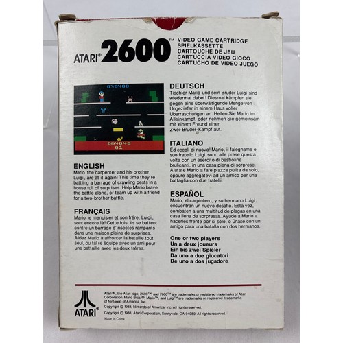 15 - Vintage 1980's Mario Bros game cartridge for Atari 26000. Boxed and complete with game manual. Box h... 