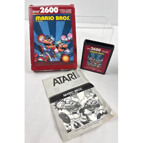 15 - Vintage 1980's Mario Bros game cartridge for Atari 26000. Boxed and complete with game manual. Box h... 