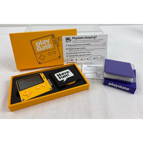 34 - Playdate - pocket-sized yellow handheld video game console by Panic Inc in collaboration with Teenag... 