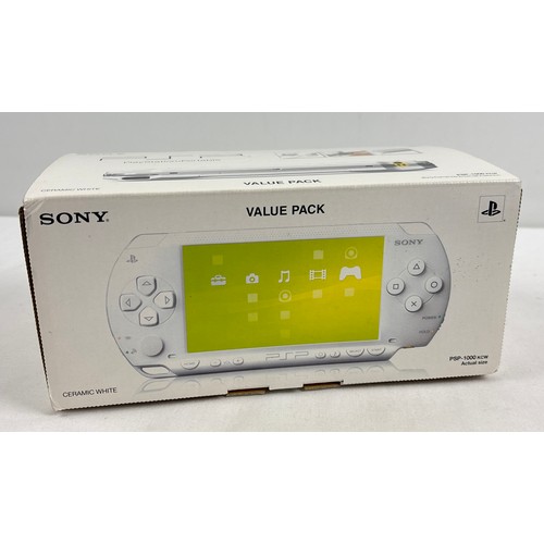 10 - A boxed original classic Sony PSP Playstation Portable 1000, region free hand held gaming console, i... 