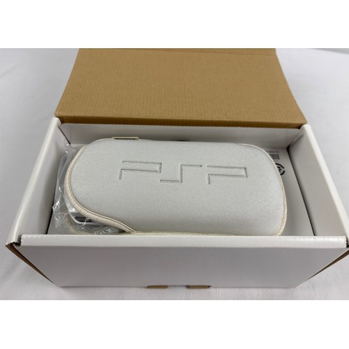 10 - A boxed original classic Sony PSP Playstation Portable 1000, region free hand held gaming console, i... 