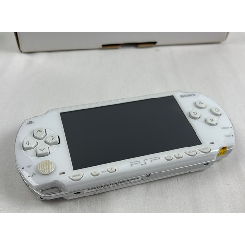 10 - A boxed original classic Sony PSP Playstation Portable 1000, region free hand held gaming console, i... 