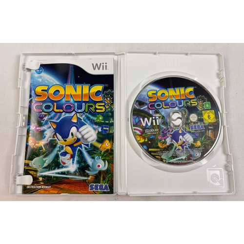 24 - 5 assorted cased Nintendo Wii game discs with manuals. Comprising: Sonic Colours, Mario & Sonic at t... 