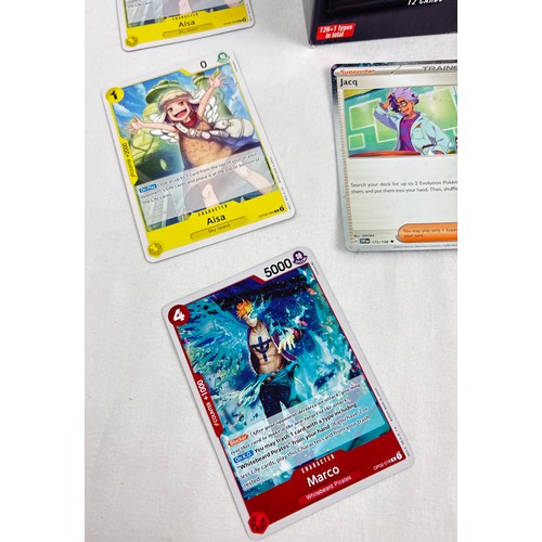 61 - A collection of trading card items. 2 x empty One Piece boxes together with an empty League of Legen... 