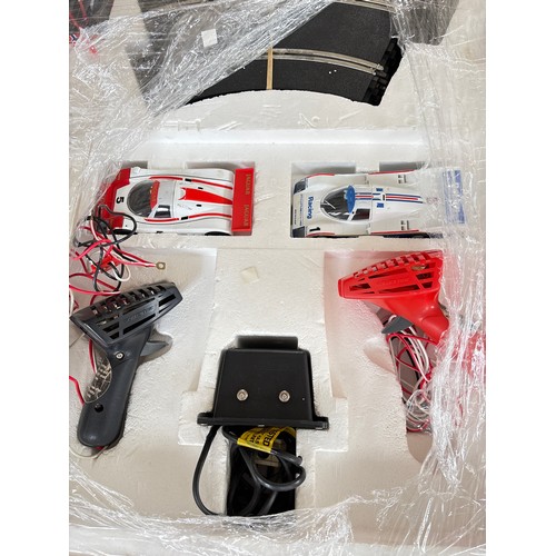 65 - A boxed Scalextric Le Mans 24 Hour set C.742, with Porsche 962C & Jaguar XJR9 racing cars and origin... 