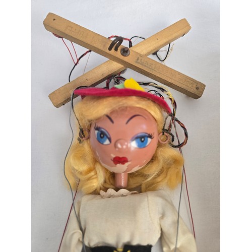 165 - A collection of vintage wooden toys together with a boxed 1950's Mitzi Pelham puppet. Wooden toys in... 