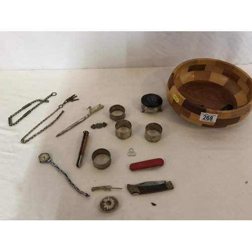 268 - WOODEN BOWL OF COLLECTABLES  IN A SILVER TRINKET BOX AND 4 SILVER NAPKIN RINGS