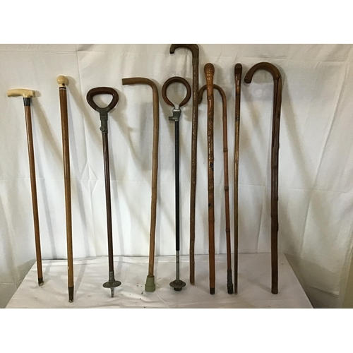 79 - QTY OF WALKING CANES & SHOOTING STICK ETC