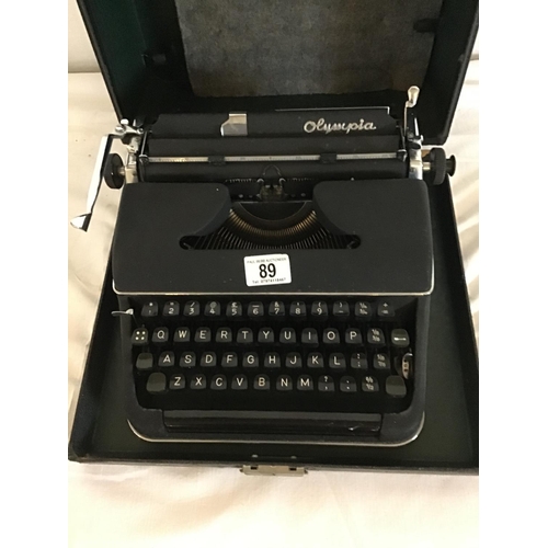 89 - OLYMPIA VINTAGE CASED TYPEWRITER