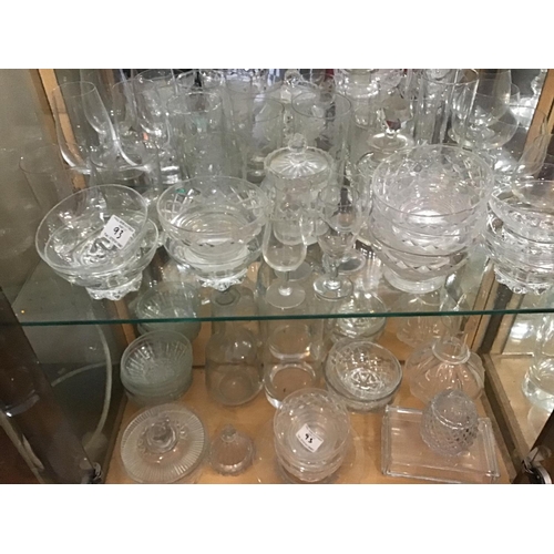 93 - LARGE QTY OF GLASSWARE TO INCLUDE DECANTERS, GOBLETS ETC