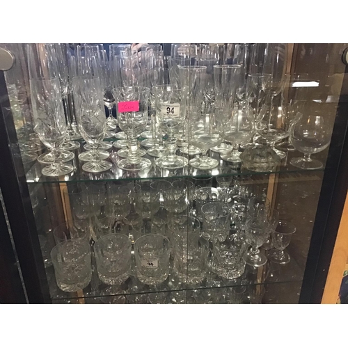 94 - LARGE QTY  OF GLASSWARE TO INCLUDE CHAMPAGNE FLUTES, TUMBLERS ETC