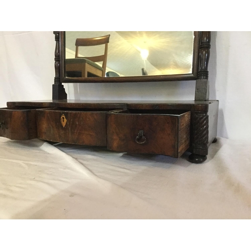 251 - EARLY MAHOGANY SERPENTINE FRONTED SWING MIRROR WITH 2 DRAWERS