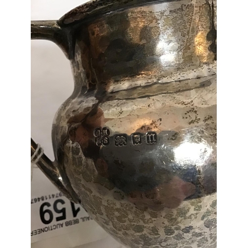 159 - HALLMARK SILVER HAMMERED SMALL JUG -4