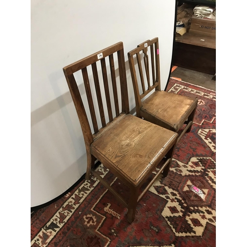 282 - 2 OAK STRETCHERED GEORGAIN HALL CHAIRS