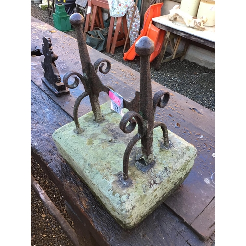 27 - EARLY CAST IRON BOOT SCRAPER SET IN STONE