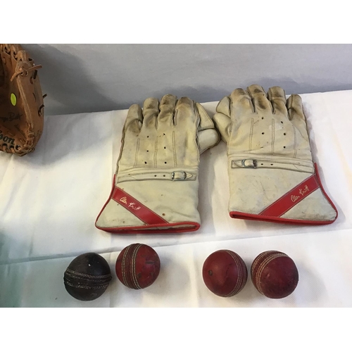 15 - PAIR OF WICKET KEEPERS GLOVES, 4 VINTAGE CRICKET BALLS AND A GEORGE BRET WILSON BASEBALL GLOVE