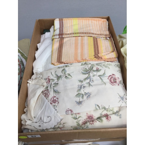 82 - BOX OF MATERIAL & CURTAINS AND AIRBED