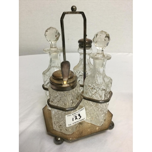 123 - SILVER PLATED 4 BOTTLE CRUET AND BRASS 2 BOTTLE CRUET