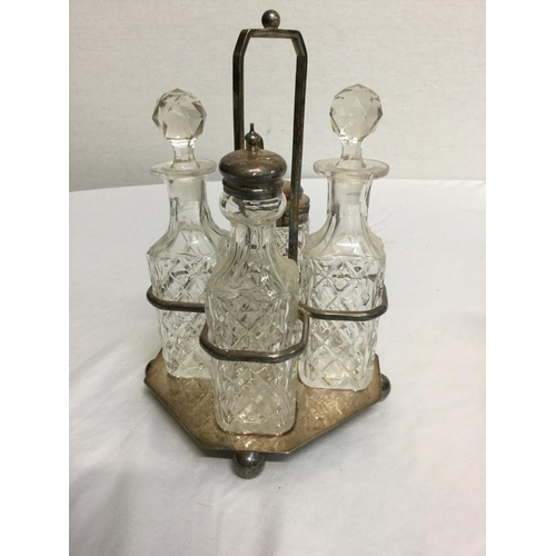 123 - SILVER PLATED 4 BOTTLE CRUET AND BRASS 2 BOTTLE CRUET