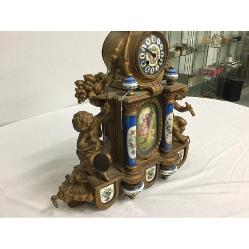 127 - VICTORIAN FRENCH GILT MANTEL CLOCK WITH HAND PAINTED PORCELAIN PANELS & SUPPORTS A/F