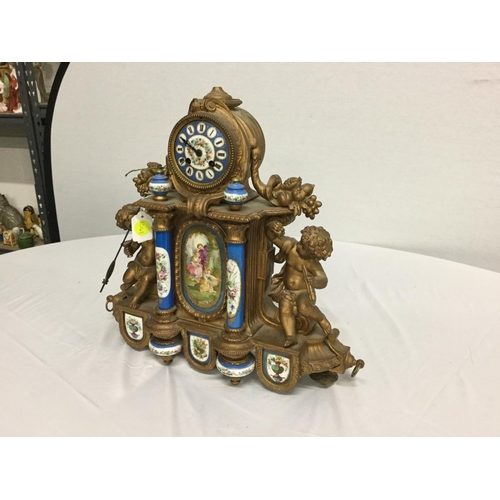 127 - VICTORIAN FRENCH GILT MANTEL CLOCK WITH HAND PAINTED PORCELAIN PANELS & SUPPORTS A/F