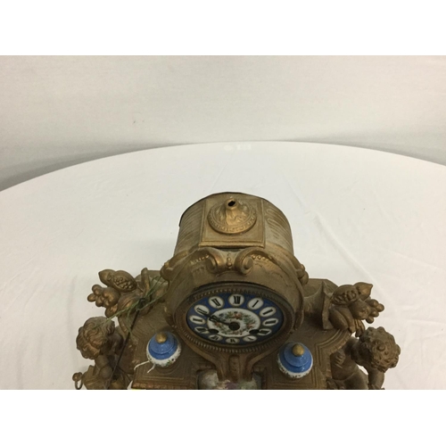 127 - VICTORIAN FRENCH GILT MANTEL CLOCK WITH HAND PAINTED PORCELAIN PANELS & SUPPORTS A/F