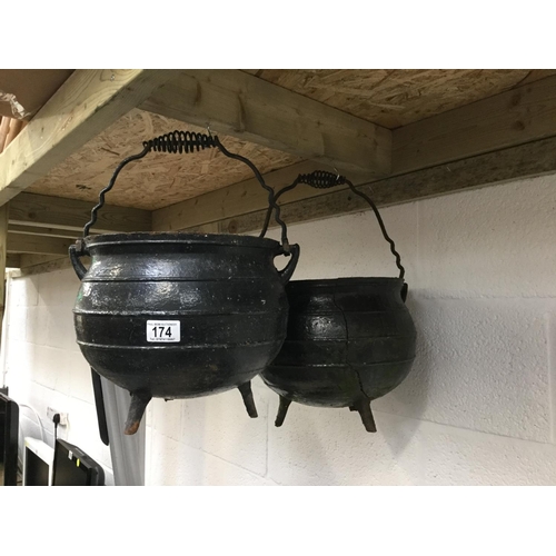 174 - PAIR OF CAST IRON GYPSY CAULDRONS - 1 A/F CRACKED