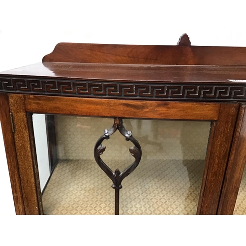 221 - MAHOGANY GLAZED DISPLAY CABINET ON CLAW & BALL FEET - GLASS CRACKED