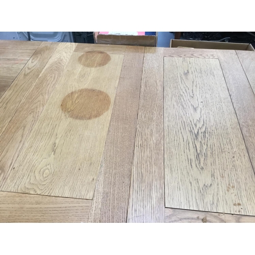 402 - LIGHT OAK EXTENDING DINING TABLE WITH 2 LEAVES - 33