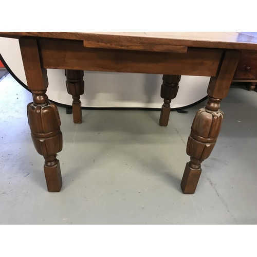 348 - VINTAGE OAK DRAWER LEAF DINING TABLE