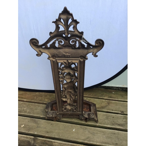 63 - CAST IRON STICK STAND   (BROKEN)