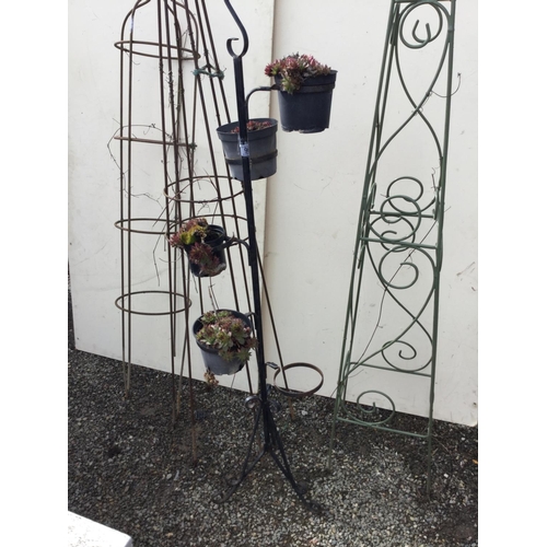 96 - 3 METAL GARDEN OBILISKS AND A METAL PLANT STAND