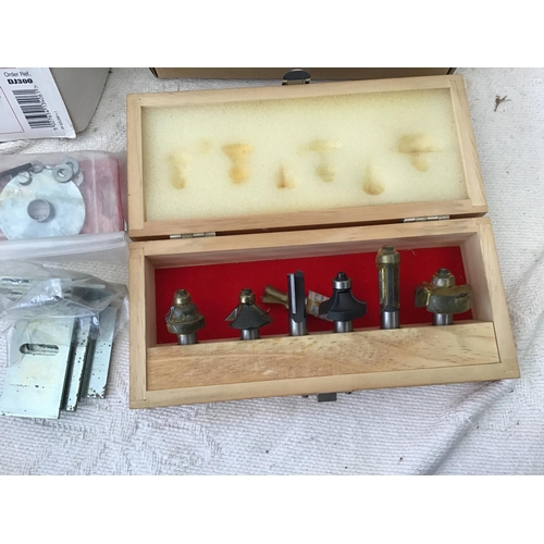 164 - DOVETAIL GIG ROUTER CUTTERS AND A ROUTER CUTTER SET W/O