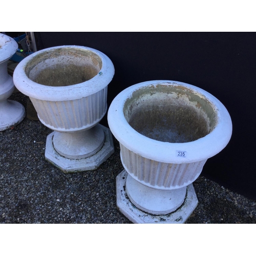 235 - PAIR OF GARDEN URNS ON PLINTHS
H 24