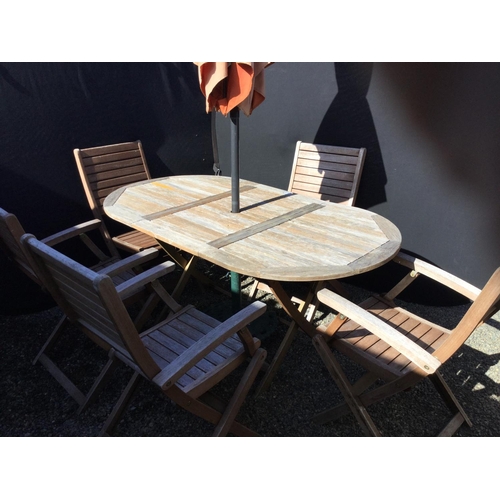 241 - GARDEN TABLE AND 6 CHAIRS AND GARDEN BROLLY WITH CAST IRON BASE
63 X 34