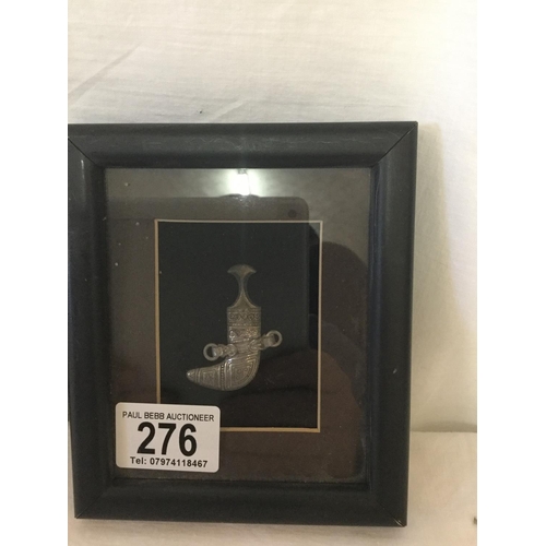 276 - 2 FRAMED SILVER ARABIC PIECES A DAGGER AND A COFFEE POT