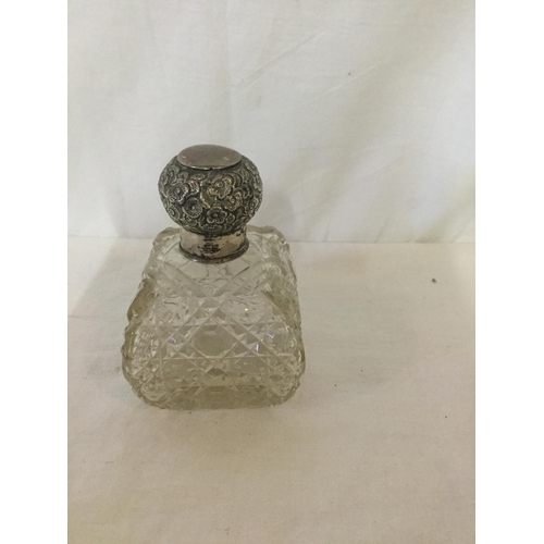 280 - PAIR OF SILVER PLATED BOTTLE COASTERS WITH LION MASK DECORATION ALONG WITH 3 SILVER TOPPED GLASS JAR... 