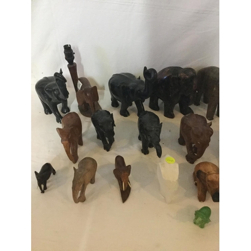 285 - 3 SHELVES OF ASSORTED ELEPHENT ORNAMENTS TO INCLUDE CARVED WOOD EXAMPLES