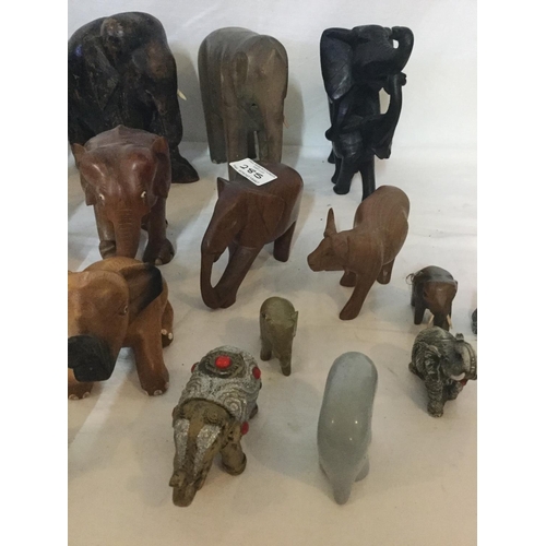 285 - 3 SHELVES OF ASSORTED ELEPHENT ORNAMENTS TO INCLUDE CARVED WOOD EXAMPLES