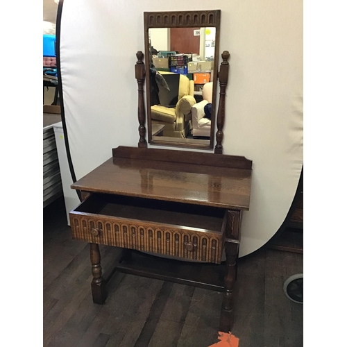 396 - OAK REPRODUCTION DRESSING TABLE AND MIRROR WITH CARVED ARCHED DECORATION