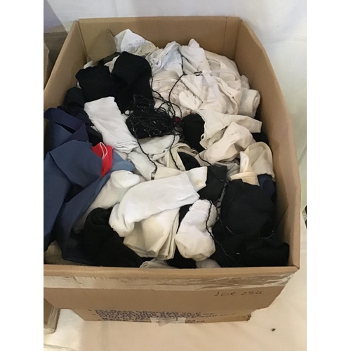 254 - 4 BOXES OF VARIOUS BLANKETS CLOTHES CUSHIONS ETC